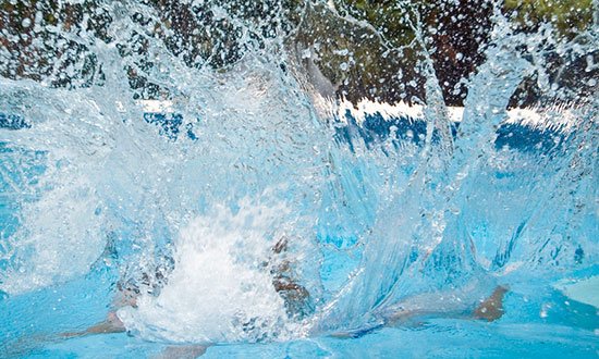 Splash of water on a swimming pool