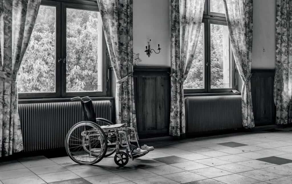 Empty wheelchair in room
