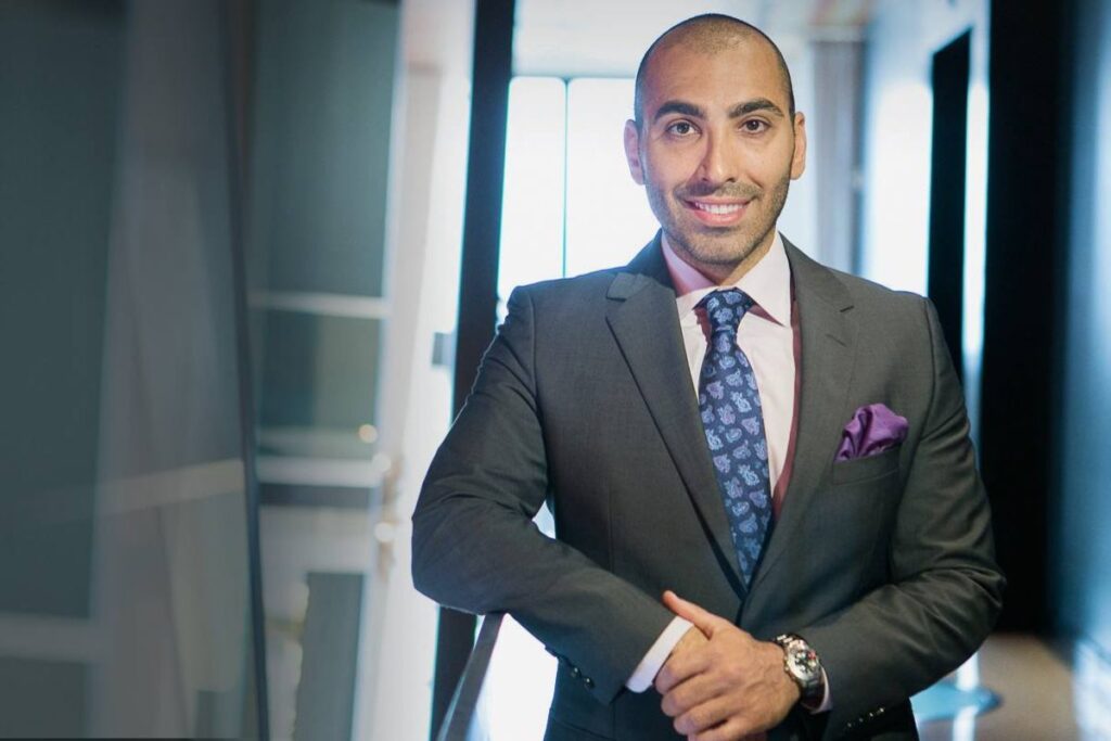 Chris Mova, founder of Mova Law Group, standing in a professional office setting in San Diego, representing experienced legal guidance for rideshare accident and personal injury cases.